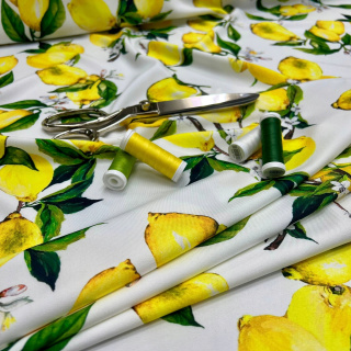 Látka viskóza twill žlutá hladká citrony vzor 0,5m